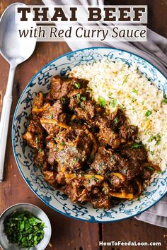 a bowl filled with beef and rice on top of a wooden table