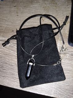 Natural Black Obsidian Stone Alloy Necklace Bail Hexagonal pile approximate 1.5" long x 0.4" across. Necklace: Black Waxed Necklace Cord String. Diameter 0.05in. 1.5mm approximate. Waxed Cotton. Lobster Claw Clasp Length approximate  17.07in long. 450mm. Cord Ends Alloy Material. Extra 1.7in Chain Extender. 45mm approximate. Delivered in a black velvet pouch Please email on: urbanwoman.grooming@gmail.com We'll be pleased to know you Black Pendant Necklace, Black Obsidian Stone, Volcanic Stone, Obsidian Stone, Cord Ends, Black Pendant, Chain Extenders, Black Obsidian, Stone Pendant