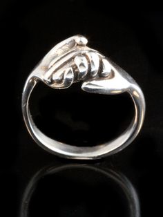 This solid sterling silver clasping Hand Ring is a classic and is beautifully executed. This design is a symbol of love, friendship, support and solidarity. We have many ring sizes immediately available. We will contact you to let you know if we have your chosen ring size in stock or when to expect shipment. All Marty Magic Jewelry is packaged in a beautiful box embossed with the gold foil Marty Magic dragon logo. Perfect for any occasion! Designed in California by Marty Magic. Made in the U.S.A Classic Rings With Spring Ring Clasp For Gifts, Unique Sterling Silver Jewelry With Tension Setting, Magic Jewelry, Dragon Logo, Friendship Ring, Hand Rings, Mother Daughter Gifts, Friendship Rings, Friendship Jewelry