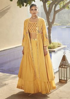 Matsya-Haldi Yellow Venetian Tripitaka Lehenga Set-INDIASPOPUP.COM Sharara For Haldi, Yellow Sharara For Haldi, Yellow Garara, Yellow Sharara, Jacket Lehenga, Cape For Women, Indian Wedding Sarees, Yellow Lehenga, Embroidered Motifs