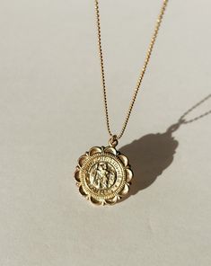 Our timeless Protector St. Christopher Necklace is the symbol of protection and guidance. The centerpiece of this necklace is a finely crafter St. Christopher charm. The Protector St. Christopher Necklace is the perfect accessory for those who seek protection and blessings through life. Protect Details 20" 14k Gold-Filled 1mm Ball Chain 22mm 14k Gold-Filled St. Christopher Charm Gold Pendant Made in Scottsdale, AZ St Christopher Necklace, Symbol Of Protection, St Christopher, The Protector, Saint Christopher, Solid Gold Jewelry, Scottsdale Az, Gold Filled Jewelry, Ball Chain