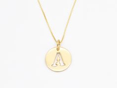 Gold Letter A Pendant made of Gold Vermeil: 18k Gold over Solid 925 Sterling Silver ☞ made to last.Matching Ring & Earrings ☞ please ask meDetails:• Letter A Pendant in Gold Vermeil• Dimensions: Pendant Height 20mm, Width 15mm• Free Complimentary Chain• 18k Gold VermeilSKU PE010490201 Yellow Gold Sterling Silver Charm Necklaces, Classic 14k Stamped Jewelry For Mother's Day, Classic 14k Jewelry For Mother's Day, Sterling Silver Yellow Gold Initial Pendant Jewelry, Yellow Gold Sterling Silver Charm Necklace For Anniversary, Yellow Gold Sterling Silver Jewelry For Mother's Day, Sterling Silver Charm Necklace Stamped 14k, Sterling Silver Hallmarked Initial Pendant, Yellow Gold Sterling Silver Charm Necklace With Initials