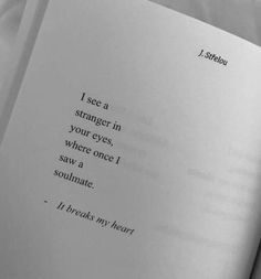 an open book with the words i see a strange in your eyes, where once i saw a soulmate