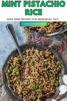 a bowl filled with rice and peas on top of a table