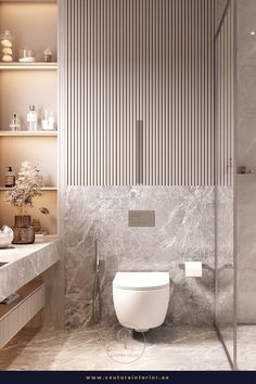 a modern bathroom with marble walls and flooring