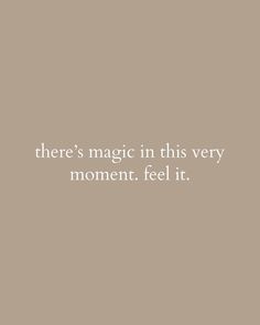 there's magic in this very moment feel it text on a beige background with white lettering