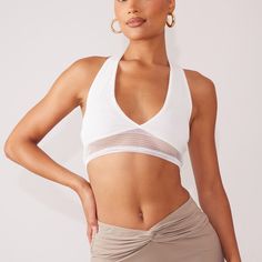 Plt White Textured Halter Neck Crop Top (New With Tag) White Halter Neck Top Bra Friendly, Chic Mesh Crop Top For Spring, White Fitted Mesh Crop Top, White Halter Neck Top With Bra-friendly Design, White Mesh Beach Top, White Halter Neck Top, Bra-friendly, White Seamless Halter Neck Top, White Seamless Racerback Halter Top, White Halter Top With Built-in Bra For Poolside