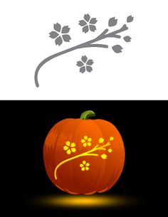 an orange pumpkin with flowers on it and the word happy written in yellow lettering below