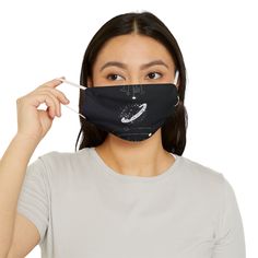 Elevate your holiday spirit with our 'Adult Celestial Cat Fitted Face Mask' perfect for your Holiday Travels. Made with 96% Polyester and 4% Spandex, these 2-layer fabric face masks deliver a snug fit while remaining comfortable to wear for long stretches of time. What's more, the adjustable toggle strap helps find the perfect fit for each head size.  🎒Free Shipping on orders over $35! 🎁Helping you to get ready for the Christmas Season, enjoy! Free Elf on the Shelf Ideas (in the product photos). ✔️Material: 96% Polyester, 4% Spandex   Extremely strong and durable synthetic polyester fabric.    Retains its shape, dries quickly. ✔️One size: 7.3'' × 4.5'' (18.54cm × 11.43cm ) ✔️Elastic adjustable straps ✔️One sided print ✔️Elastic band   The back band is stretchy and elastic, so that it can Travel Free, Cat Face Mask, Elf On The Shelf Ideas, Shelf Ideas, Cat Face, On The Shelf, Product Photos, Christmas Season, Holiday Travel