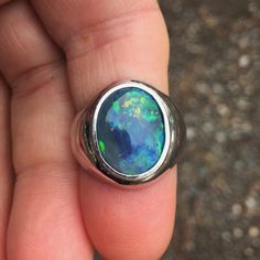 Modern Oval Opal Ring, Modern Round Opal Ring, Australian Black Opal Engagement Ring, Opal Oval Cabochon Ring With Polished Finish, Mens Black Opal Ring, White Cabochon Opal Ring In Sterling Silver, Polished Opal Oval Cabochon Ring, Black Australian Opal Ring, Polished Opal Ring In Oval Cabochon Shape