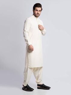 Mens Cream White Plain Shalwar Kameez Mens Eid Shalwar Kameez Color: Cream White Fabric: Wash and wear Dress Type: Handmade Please beware when you're choosing the variations of this dress. Feel free to discuss any issue regarding your order. You'll get a quick solution and will be satisfied. Traditional Cotton Kurta With Naqshi, Designer Cotton Sherwani With Naqshi Detail, Designer Cotton Sherwani With Naqshi, Designer Naqshi Churidar For Eid, Eid Naqshi Churidar With Traditional Drape, Unstitched Dabka Traditional Wear For Ceremonies, Cotton Nehru Jacket With Dabka Work For Eid, Traditional Salwar Kameez With Naqshi For Festivals, Traditional Salwar Kameez With Naqshi For Diwali