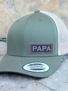 "PAPA PATCH PREMIUM 6 Panel adjustable snapback structured trucker hat. Adjustable snapback OSFM so one size should fit your Papa! The perfect gift for any Dad, Fathers Day or Dad's Birthday! Give the perfect gift to your PAPA! NOTE: Pick your hat color when you place your order. Adjustable snap back so one size fits most! 6 Panel Structured Trucker Hat: Hat Color: Various Fabric: Cotton-Poly/Nylon Mesh Size: Adjustable Snapback One Size Fits Most Washing instructions; Hand wash cold only, wipe Adjustable Dad Hat With Letter Print In Trucker Style, Adjustable Trucker Dad Hat With Letter Print, Father's Day Trucker Baseball Cap With Curved Brim, Adjustable Trucker Hat With Curved Brim For Father's Day, Curved Bill Trucker Hat With Letter Print As Gift, Adjustable Snapback Hat For Father's Day, Adjustable Snapback Hat With Curved Brim For Father's Day, Adjustable Flat Bill Snapback Hat For Father's Day, Adjustable Curved Brim Hat For Father's Day