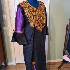 One Of A Kind African Dress. Pull Over Os With Amazing Embroidered Sleeves, Pleats And Intricate Neckline. Amazing Work Of Art, I Am Willing To Share. Handmade From Zambia, South Central Africa (Purchased In Zambia). Os For This Is M/Large Fit For American Sizes. Black With Royal Purple And Gold. (New - Never Worn) Central Africa, Embroidered Sleeves, South Central, Royal Purple, Zambia, African Clothing, African Dress, Embroidery, Womens Dresses