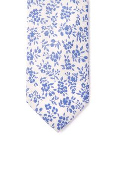 Complete your special occasion with this beautiful floral print necktie. Vibrant floral motifs entwine and cascade down this romantically fun cotton tie. 100% Cotton 58" long and 2.5" wide Slim Tie Parquet Top quality fabric Imported Elegant Blue Cotton Ties, Formal Cotton Ties With Floral Print, Cotton Standard Tie For Summer, Summer Formal Ties With Floral Print, Summer Floral Print Tie, Elegant Patterned Tie With Floral Print, Summer Floral Print Ties, Summer Floral Print Standard Tie, Summer Floral Print White Ties