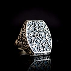 Introducing our elegant large silver ring, crafted with great skill and precision in 925 sterling silver. Its oval shape elegantly adorns your finger, while its intricate carved floral patterns enchant with vintage inspirations. This artisanal masterpiece has exceptional ergonomics, ensuring a comfortable fit for everyday wear. Being stone-free allows the focus to be on the meticulous craftsmanship and the timeless elegance of the piece. Elevate your style with this one-of-a-kind ring with a uni Luxury Silver Rings With Classic Design, Luxury Oval Signet Ring With Intricate Design, Luxury Silver Oval Engraved Ring, Luxury Silver Engraved Oval Ring, Classic Sterling Silver Rings In Silver, Classic Design Silver Rings In Sterling Silver, Elegant Silver Oval Signet Ring, Heirloom Silver Rings With Classic Design, Heirloom Silver Ring With Classic Design