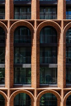 a large brick building with many arched windows