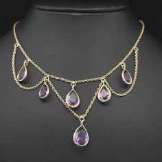 -Stone(s)- (6) Natural Genuine Amethyst - Teardrop Pear Cut - Bezel Set - Medium Purple Color - 7.46 x 5.48mm to 9.81 x 6.69mm (approx.) Material: 14k Yellow Gold Weight: 5.24 Grams Chain Length: 16.5"  Chain Type: Cable Link  Closure: Spring Ring Clasp Condition: Excellent condition! Stock Number: JO-17026216 Amethyst Chandelier, Clothing Design Sketches, Medium Purple, Clothing Design, Pear Cut, Spring Rings, Jewelry Ideas, Chain Lengths, Purple Color