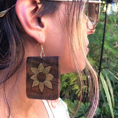 This set is handcrafted and hand burned. It is made out of Bay Area all natural Walnut wood.  It is painted with a light metallic gold to bring out the flower design. The set is coated with a shiny shellac finish.  This item is very lightweight and is 100% locally handmade in San Francisco, CA Natural Walnut, Large Earrings, Walnut Wood, Metallic Gold, Bay Area, Flower Design, Flower Designs, Jewelry Earrings Dangle, Gold Metal