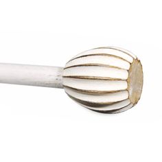 a close up of a white and gold colored object on a white background with clippings