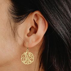 Elegant script lettering on these monogram earrings gives your style an extra personal touch. Initials will appear exactly as entered. Must be three letters, center initial will be enlarged.Back: LeverbackPersonalize: Initials will appear exactly as entered. Must be three letters, center initial will be enlarged.Features: Monogrammable, PersonalizedShape: RoundMetal Color: YellowEarring Length: 25mmEarring Width: 25mmCare: Wipe CleanEarrings Style: Drop EarringsMetal: 14k Gold Over SilverAssemb… Elegant Monogram Earrings As Gift, Elegant Personalized Earrings, Elegant Gold Monogram Earrings, Personalized Gold Earrings, Monogram Earrings, Silver Monogram, Script Lettering, Earrings Drop, Personal Touch