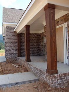 the front porch of a house under construction