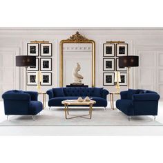 an elegant living room with blue couches and gold accents