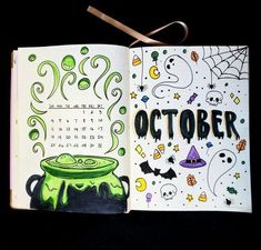 an open halloween coloring book on a black background with the words october written in it