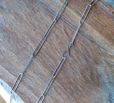 This chunky solid sterling silver chain has an amazing sparkle! It is very stylish, extra long oval link chain with hand forged hook.  Wear it alone or combine with your other sterling silver necklaces. Link size is 25mm by 4.4mm  It can be worn as a Y necklace as well, since you can attach the hook to any link of the chain.   The chain measures about 20.5 inches long including my handmade hammered hook. I can't make longer necklace for this particular variety of chain, but I can make it shorter Silver Chain Necklace With Hook And Links For Gift, Silver Oval Paperclip Chain Necklace, Y Necklace, Santa Clara, Sterling Silver Chain, Hand Forged, Link Chain, Sterling Silver Chains, Long Necklace