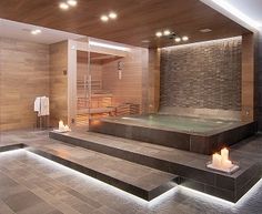 a bathroom with a large jacuzzi tub next to a walk - in shower