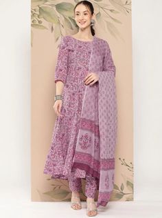 *Women Floral Printed Regular Pure Cotton Kurta with Trousers & With Dupatta Indian Summer Wear For( Women/ Indian Wedding Wear / Indian Plus Size Dress For Women / Customisation Available *Lavender printed Kurta with Trousers with dupatta * Kurta design:- * Floral printed * Anarkali shape * Regular style * Round neck, three-quarter regular sleeves * 1 pockets * Calf length with flared hem * Pure cotton fabric * Trousers design:- * Printed Trousers * Elasticated waistband * Slip-on closure  Wash Care:- Hand Wash  AVAILABLE IN 6 SIZES THEY ARE IN FOLLOWING MEASUREMENTS IN INCHES:- XS:- Bust-34/Shoulder-13.5/Top Length-48/Bottom Waist-26/Bottom Length-36/Hip-38 S:- Bust-36/Shoulder-14/Top Length-48/Bottom Waist-28/Bottom Length-36/Hip-40 M:- Bust-38/Shoulder-14.5/Top Length-48/Bottom Waist-3 Ankle-length Printed Motifs Salwar Kameez, Fitted Pink Block Print Salwar Kameez, Pink Semi-stitched Block Print Anarkali Set, Purple Anarkali Set With Chikankari Embroidery, Lavender Anarkali Semi-stitched Sets, Wedding Salwar Kameez In Pink With Block Print, Anarkali Sets In Lavender For Diwali, Unstitched Lavender Traditional Kurta, Unstitched Traditional Lavender Kurta