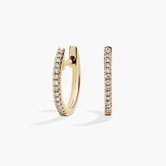 Our petite diamond huggie hoop earrings are so versatile you'll reach for them every day. Crafted in 14k yellow gold, with lines of round brilliant-cut pavé diamonds, these mini hoop earrings offer subtle sparkle and essential style. Diameter of hoop measures 1/2 Inch. Diamond Huggies, Mini Hoop Earrings, Diamond Hoop Earrings, Blue Nile, Huggie Hoop Earrings, Round Brilliant Cut, Pave Diamonds, Round Brilliant, Hoop Earrings