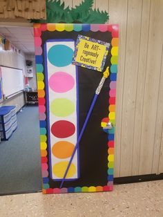 a classroom door decorated to look like an art project