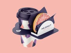 a donut sitting on top of a coffee cup