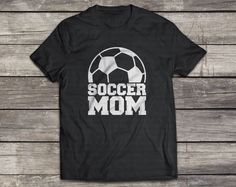 a black shirt that says soccer dad on it