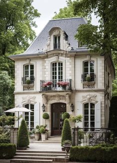 a large white house with lots of windows