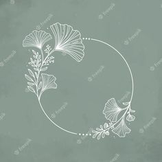 a circle with flowers and leaves drawn in white ink on a green background illustration by person