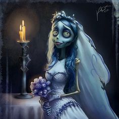 the corpse bride is holding a candle in her hand and wearing a blue wedding dress