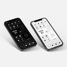 two remote controls sitting next to each other