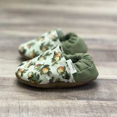 "*New!* Add a personalized tag to your moccasins (see personalization instructions)! These adorable moccasins are perfect for your little one! Trendy and comfortable, our moccasins are guaranteed to stay on your baby or toddler's feet. These are one-of-a-kind, handmade moccasins that can be paired with any outfit. Each pair is made with durable cloth and layers of felt and lined with luscious fleece for extra comfort while a heel guard reinforces the quality. These moccasins have a soft leather- Casual Slip-on Booties For Playtime, Spring Gift Booties With Soft Sole, Casual Moccasins With Round Toe For Playtime, Casual Round Toe Moccasins For Playtime, Casual Spring Booties For Playtime, Casual Round Toe Moccasins, Casual Spring Booties For Outdoor Play, Casual Moccasins With Soft Sole And Closed Toe, Casual Booties With Soft Sole As Gift