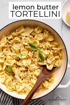 a skillet filled with lemon butter tortellini