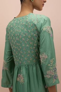 Jade green anarkali with block printed floral motifs, embellished by beads. Comes with pant and dupatta. - Aza Fashions Green Churidar With Printed Motifs For Navratri, Green Bollywood Dress With Floral Embroidery, Bollywood Green Dress With Floral Embroidery, Designer Green Anarkali Set With Floral Embroidery, Green Traditional Churidar With Printed Motifs, Traditional Green Churidar With Printed Motifs, Anarkali Green Churidar With Printed Motifs, Fitted Pista Green Anarkali Set With Floral Embroidery, Transitional Season Green Salwar Kameez In Maxi Length