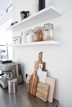 the kitchen is clean and ready to be used as a coffee bar or restaurant counter