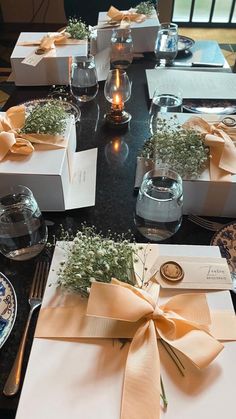 the table is set with place settings for dinner