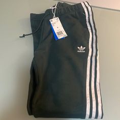 Green Adidas Pants Size 6 Casual Green Bottoms With Three Stripes, Spring Cotton Sweatpants With Three Stripes, Adidas Cotton Joggers For Spring, Spring Adidas Cotton Joggers, Adidas Casual Loungewear Pants, Casual Adidas Joggers For Spring, Casual Three Stripes Joggers For Spring, Adidas Green Casual Bottoms, Adidas Casual Pants With Three Stripes