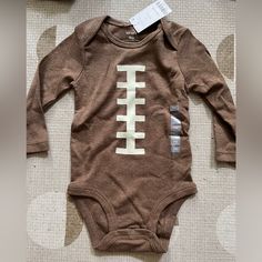 Nwt! For The Littlest Football Fan Size 9 Months. Cute Brown Tops For Playwear, Brown Long Sleeve Tops For Playtime, Fall Playwear Onesie, Cute Brown Tops For Playtime, Brown Onesie For Playtime In Fall, Brown Fall Onesie For Playtime, Fall Playtime Brown Onesie, Fitted Tops For Fall Playwear, Strawberry Romper