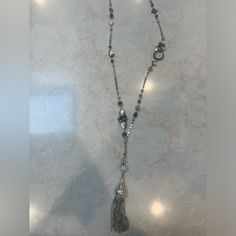 Never Worn. Missing Tags. Gorgeous Silver And Black Tassel Necklace. Silver Tassel Necklace For Party, Silver Bohemian Tassel Necklace For Party, Elegant Black Tassel Necklace, Silver Adjustable Long Tassel Necklace, Adjustable Silver Long Tassel Necklace, Adjustable Long Silver Tassel Necklace, Elegant Silver Dangle Tassel Necklace, Silver Long Necklace With Tassels, Elegant Black Tassel Necklace For Party