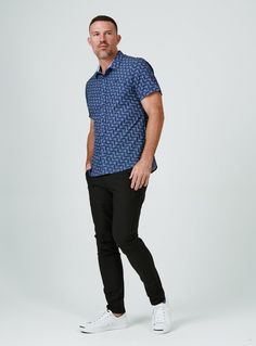 We created the perfect short sleeve button up, with the right mixture of comfort and style, just for you. Our performance shirts have 4-way stretch, are moisture wicking, wrinkle resistant and above all a great new addition to your wardrobe. The performance shirt will be your go-to for any occasion - day to night. This is a shirt that will have you satisfied at any given time. Details Model is 6'1" and wears a size medium. Care: Machine wash cold on delicate cycle with similar colors. Do not use Casual Navy Collared Short Sleeve Shirt, Casual Navy Tops For Golf, Navy Casual Tops For Business Casual, Casual Cotton Shirt With 4-way Stretch, Casual Shirt With 4-way Stretch For Workwear, Casual 4-way Stretch Shirt For Work, Casual Short Sleeve Stretch Shirt, Navy Business Casual Shirt, Navy Casual Shirt For Business Casual