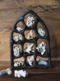 some rocks are sitting on top of a shelf