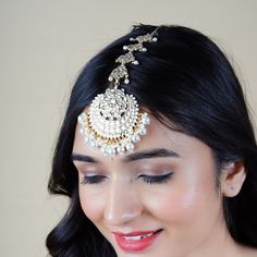 Give yourself that beautiful look and make others jealous with our traditional ethnic jewelry. Versatile design, can be teamed with any ethnic outfit . Boost your style quotient with this beautiful maang tikka set. Team it with your wedding party dresses and heels to complete the look. Fish Hook at the end of each chain to attach to the hair with a bobby pin. Want romantic accessory? A head Maang Tikka may make you a focus of attention.BRAND: MUCH-MORE is your one stop destination for making any Kundan Bridal Accessories With Tilla For Marriage, Bollywood Style Bridal Accessories With Tilla For Wedding, Bollywood Style Wedding Bridal Accessories With Tilla, Bollywood Wedding Bridal Accessories With Tilla, White Bridal Accessories With Stone Work For Wedding, Festive Bridal Accessories With Tilla For Marriage, Hand Set White Tikka For Wedding, White Tikka With Intricate Design For Wedding, White Stone Work Tikka For Wedding