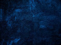 an abstract blue background with black spots